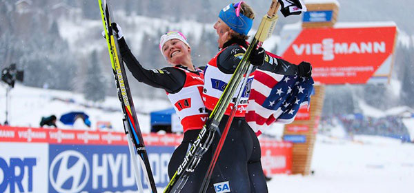 Kikkan gives Jessie Diggins a chest bump after winning gold at 2018 Olympics